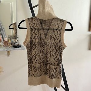 Jean Paul Gaultier wool sweater vest, printed as a sweater; cream turtleneck.